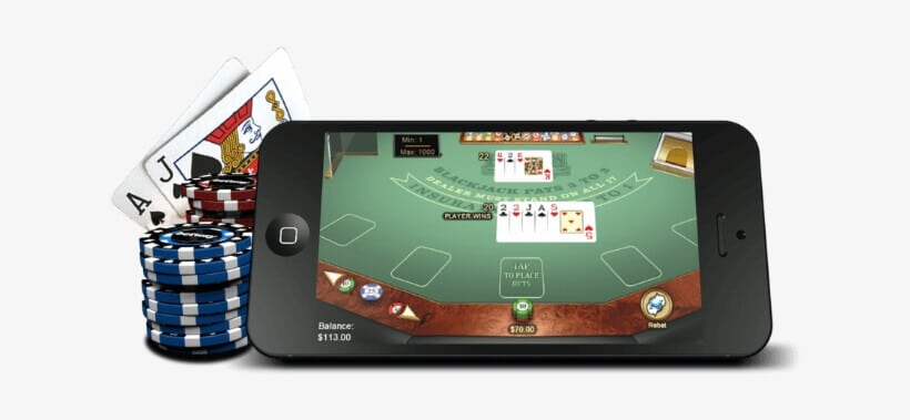 a iphone serrounded bij pokerchips and cards while showing slotgames on screen