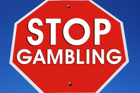 stop sign saying STOP GAMBLING