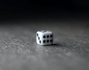 A dice on a wooden underground